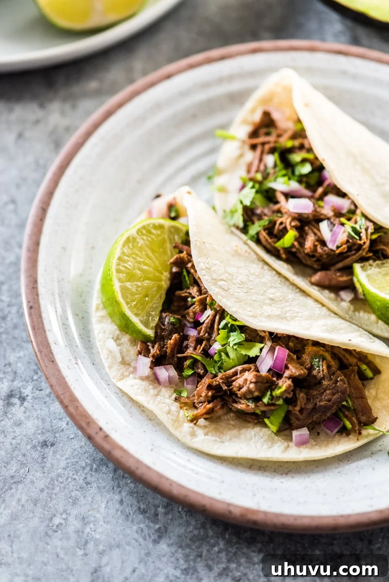 The ultimate Instant Pot Shredded Beef recipe, full of flavor and easy to make.
