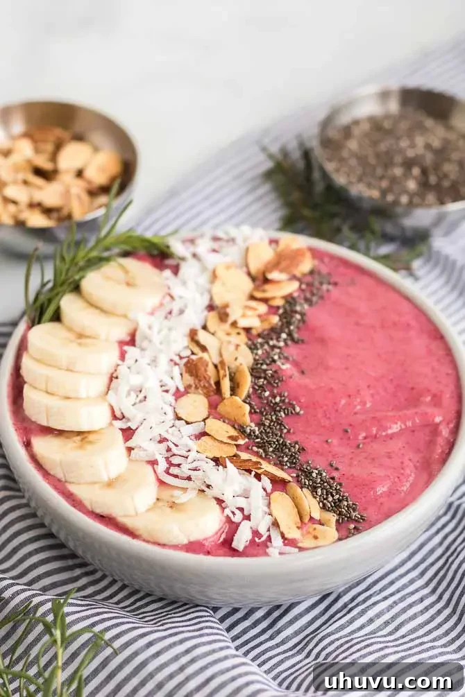 Finished cranberry banana smoothie bowl with toppings