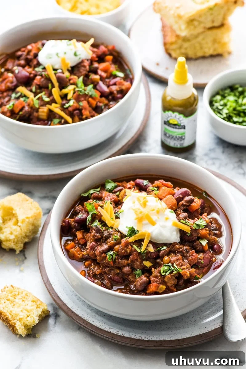 Fiery Plant-Based Chili 5 This Spicy Vegetarian Chili is thick, satisfying and super filling! Serve it with your favorite toppings for an easy and healthy meatless meal. (gluten free, vegetarian, vegan) Featuring Yellowbird hot sauce and served with jalapeno cornbread.