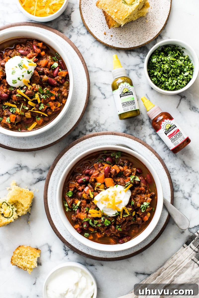 Fiery Plant-Based Chili 6 A beautifully topped bowl of spicy vegetarian chili, ready to be enjoyed.