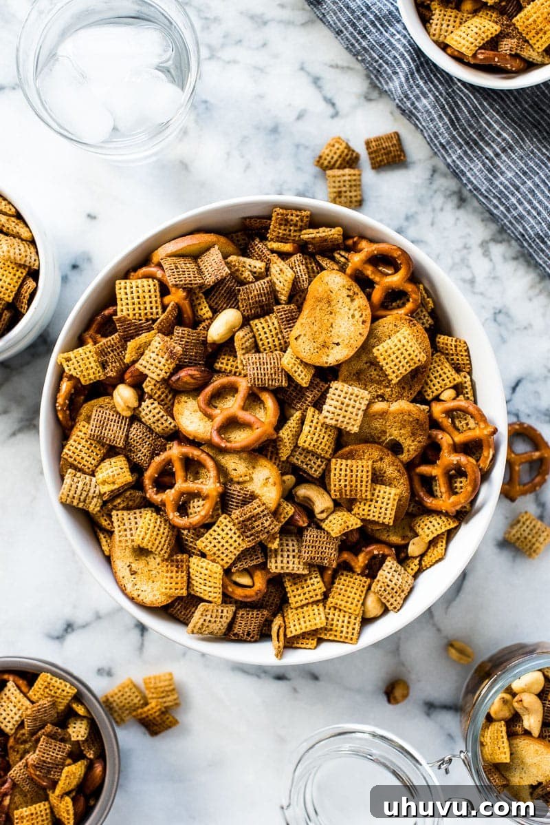 Addictive Fiery Chex Mix 5 An array of delicious variations and mix-ins for homemade Chex Mix, highlighting customization options.