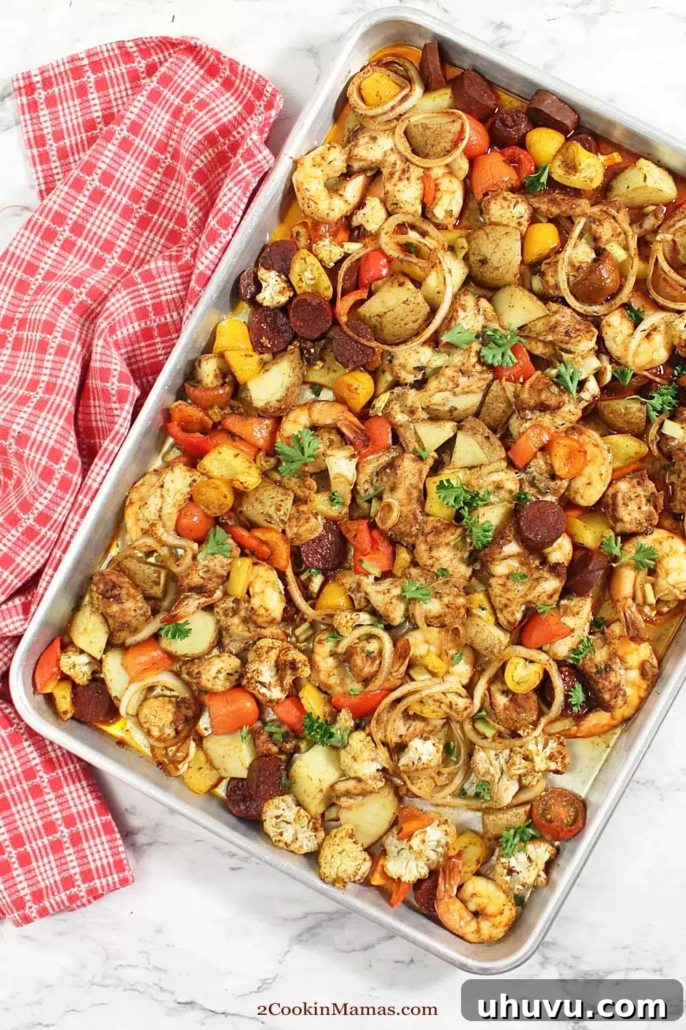 Effortless Eats: Healthy Sheet Pan Dinners 18 Cajun Mixed Grill Sheet Pan Dinner, a vibrant and spicy seafood meal