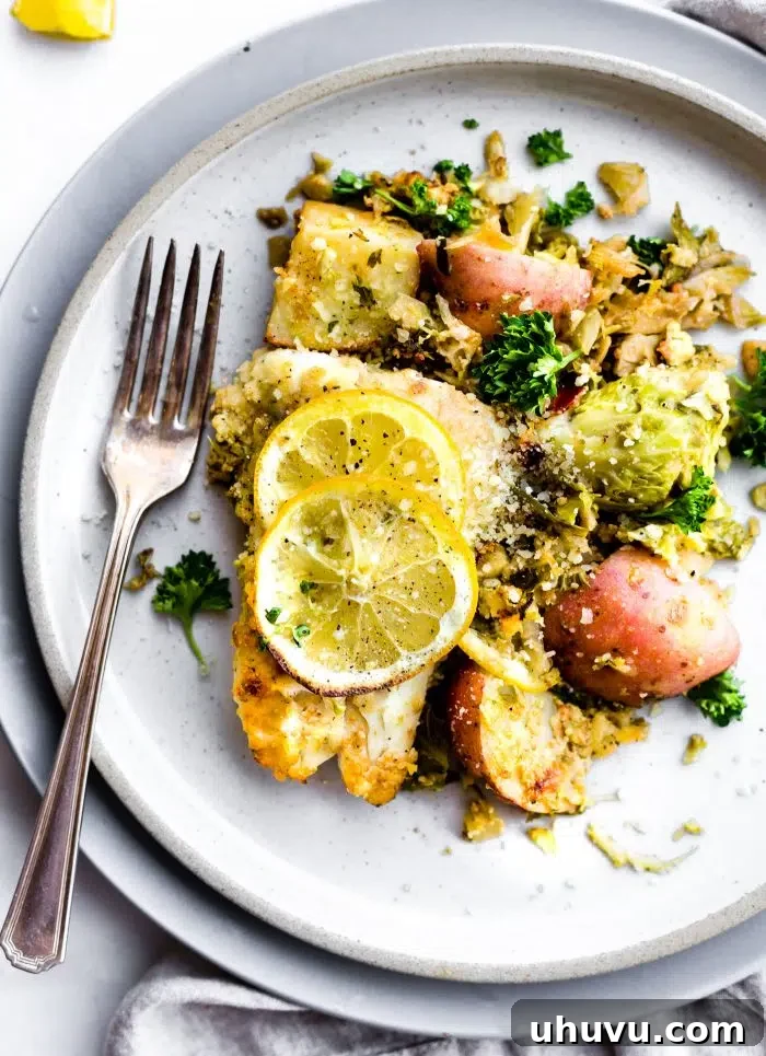 Effortless Eats: Healthy Sheet Pan Dinners 19 Honey Mustard Baked Fish with Vegetables on a plate, a healthy and quick dinner