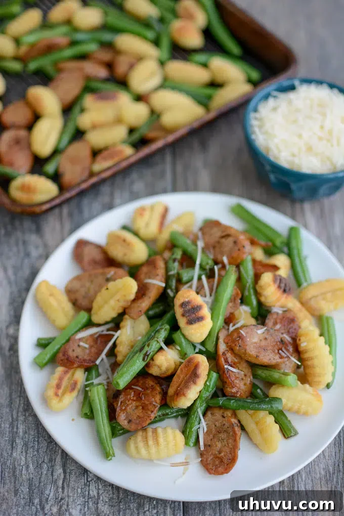 Effortless Eats: Healthy Sheet Pan Dinners 3 Sheet Pan Gnocchi and Chicken Sausage on a plate - a comforting sheet pan dinner