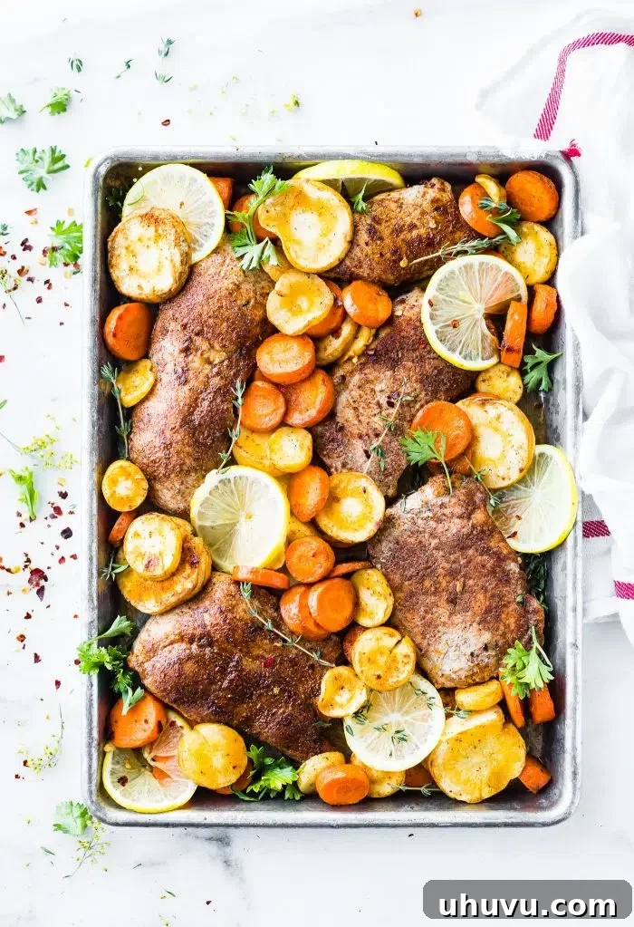 Effortless Eats: Healthy Sheet Pan Dinners 9 Baked Pork Chops and Veggies on a Sheet pan, a quick and tasty dinner