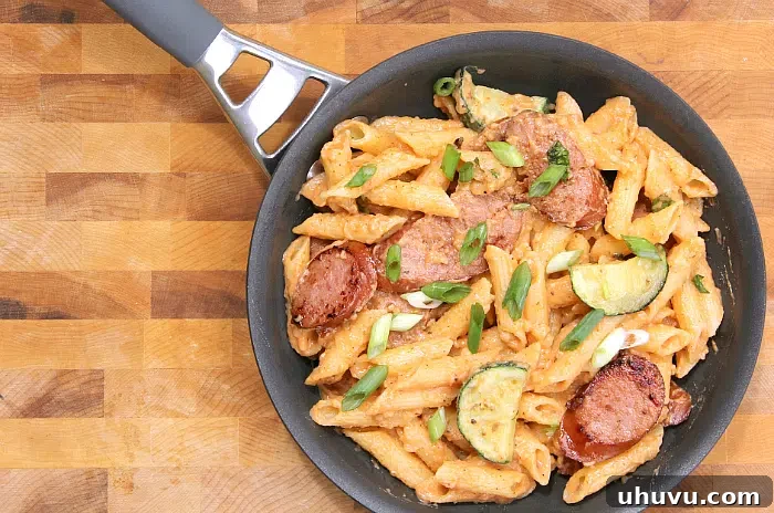 Sriracha Cream Sauce with Kielbasa Skillet, a spicy and creamy one-pan dish.