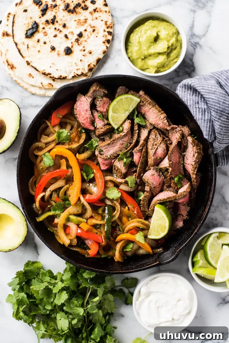 Sizzling Skillet Steak Fajitas, a popular Mexican-inspired one-pan meal.