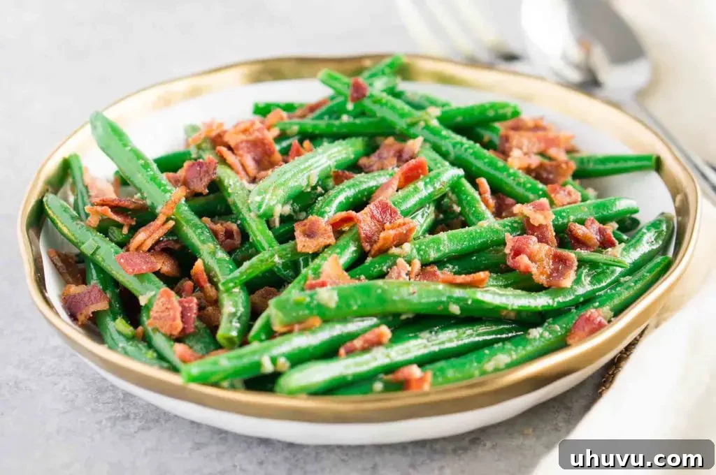 Close-up of bacon garlic green beans in a skillet