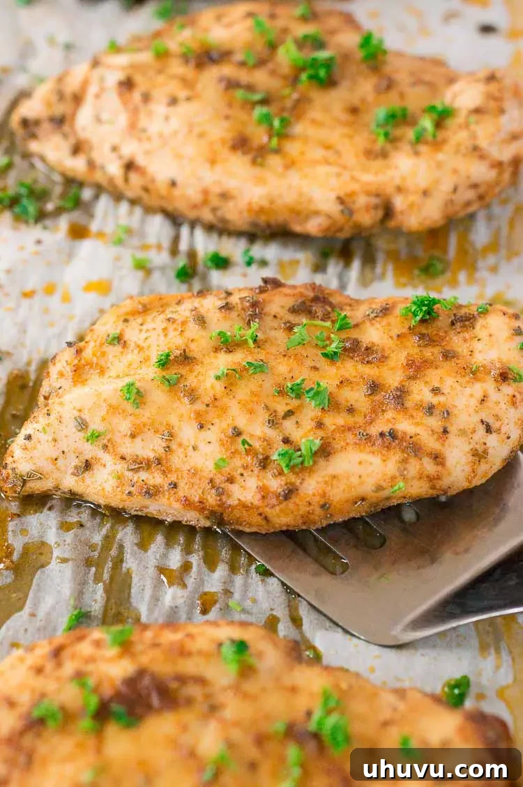 Perfectly oven baked chicken breast, golden and ready to serve