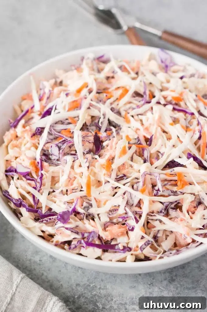 A large bowl of fresh, creamy homemade coleslaw ready to serve