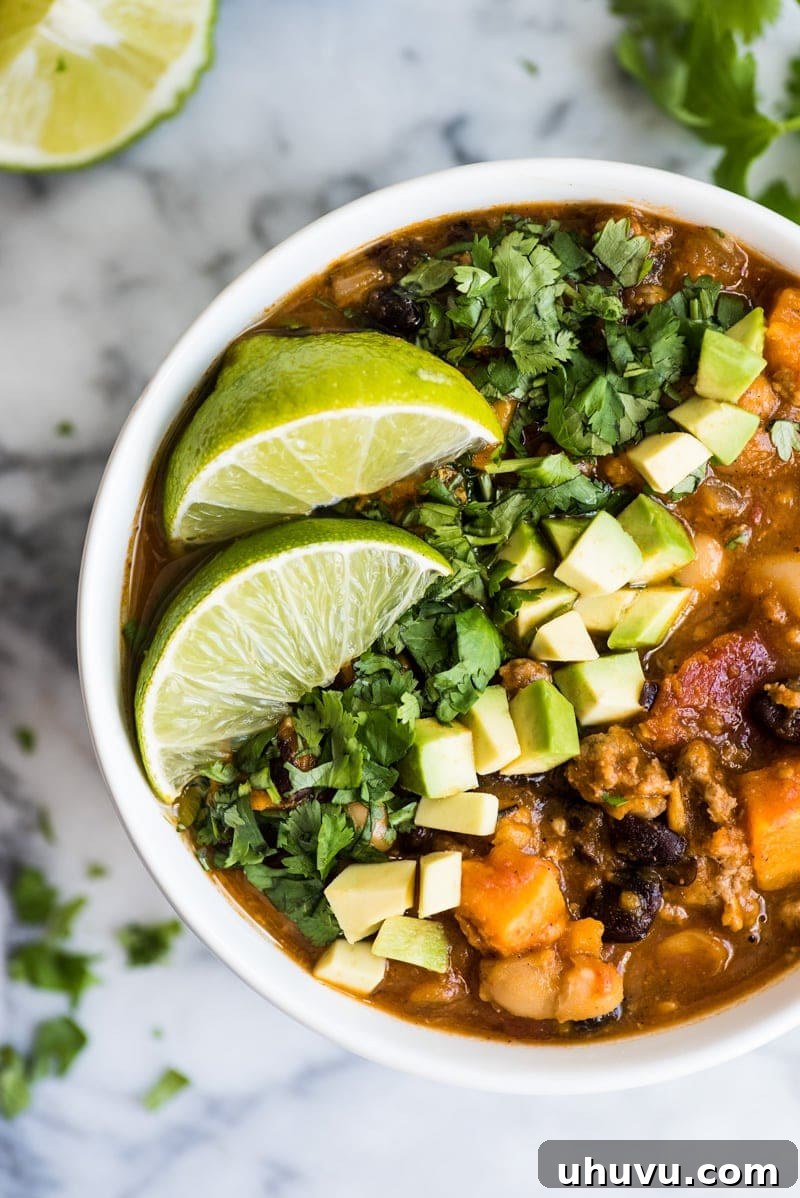 Guilt-Free Mexican Favorites 13 Chipotle Pumpkin Turkey Chili - A healthy one-pot chili with pumpkin, sweet potatoes, and chipotle.