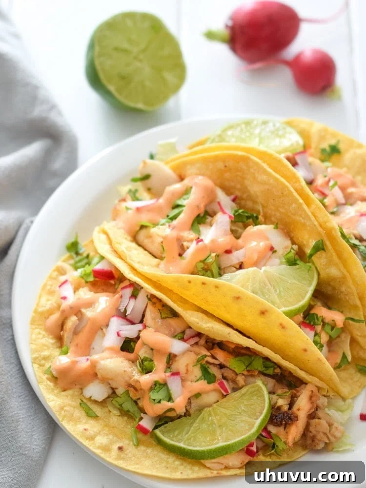 Guilt-Free Mexican Favorites 15 Fish Tacos with Chipotle Lime Crema - Quick and healthy fish tacos with a creamy, zesty sauce.