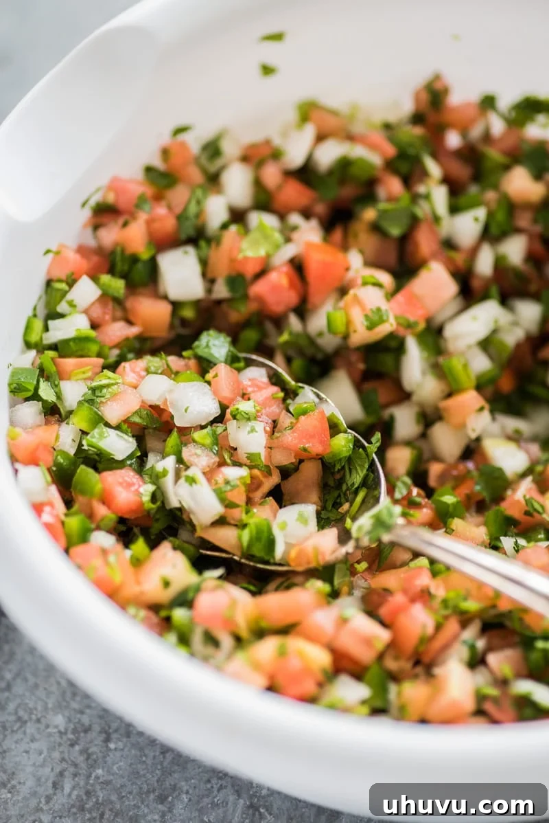 Guilt-Free Mexican Favorites 18 Mexican Pico de Gallo Recipe - A fresh, healthy appetizer or topping with tomatoes, onions, and cilantro.