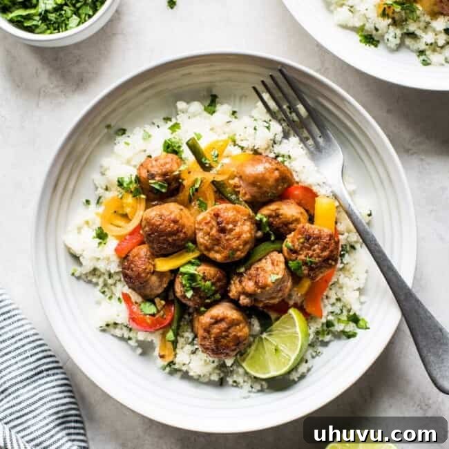 This Healthy Turkey Fajita Rice Bowl recipe is made with delicious cilantro lime cauliflower rice, savory peppers and onions and spicy turkey! (low carb, gluten free, paleo)