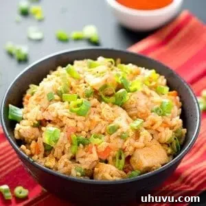Flavorful Chicken Fried Rice with a hint of spice, perfect for using leftovers.