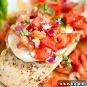Fresh and juicy Grilled Chicken Caprese with mozzarella, tomatoes, and basil.