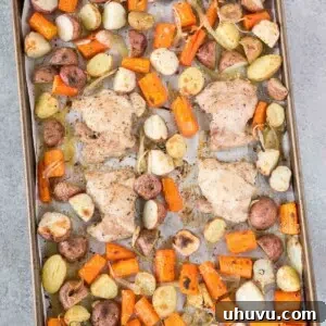 Hearty Baked Chicken and Potatoes on a single sheet pan, ready for a comforting family meal.