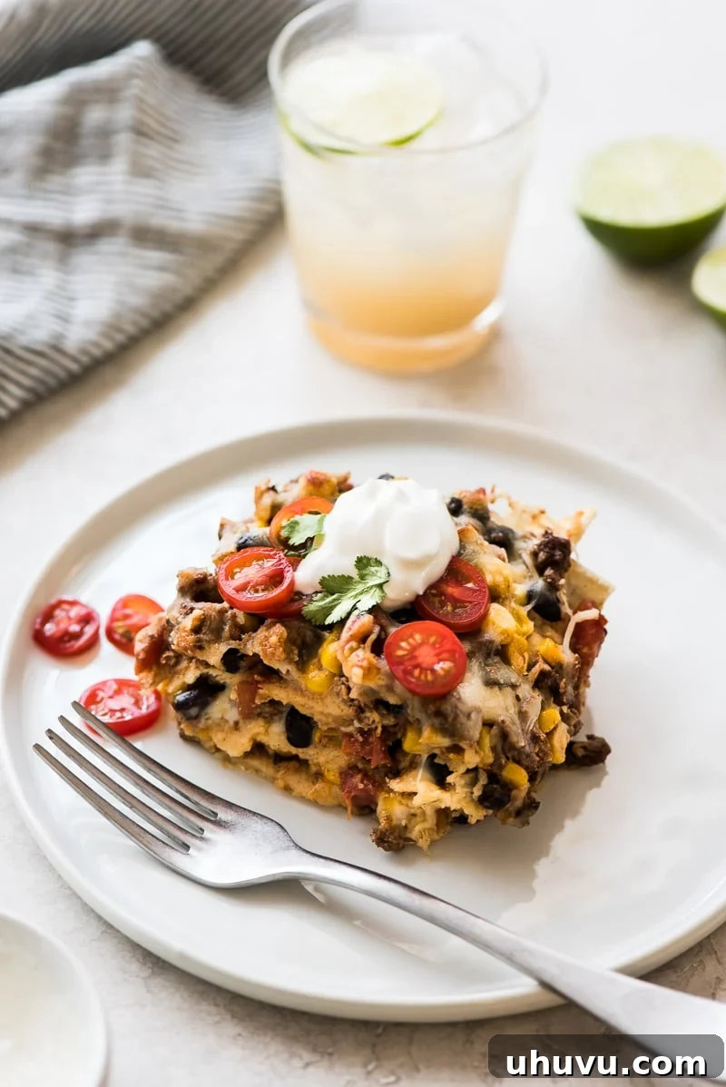 Effortless Taco Delight 11 A slice of Easy Taco Casserole in a serving dish.