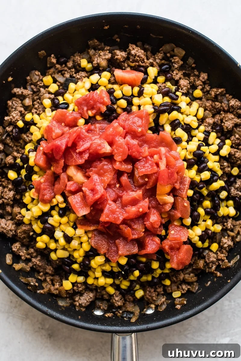 Effortless Taco Delight 5 Stirring the taco filling ingredients together.