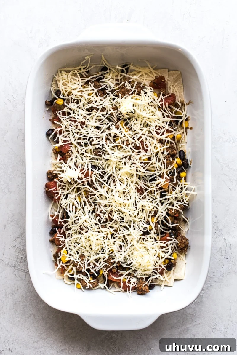 Effortless Taco Delight 9 Another view of the taco casserole layers in a baking dish.