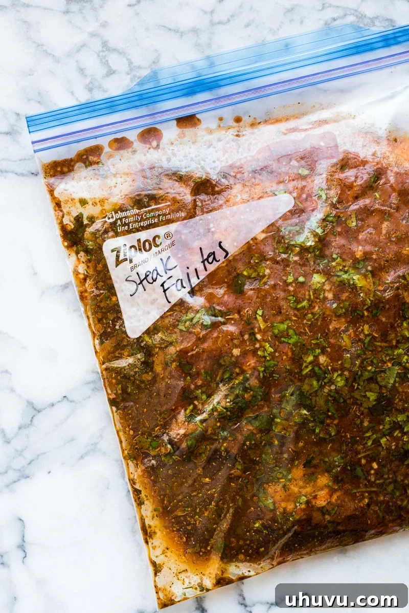This Steak Fajita Marinade is made with olive oil, orange juice, lime juice, garlic and flavorful herbs and spices that result in tender and juicy fajitas!