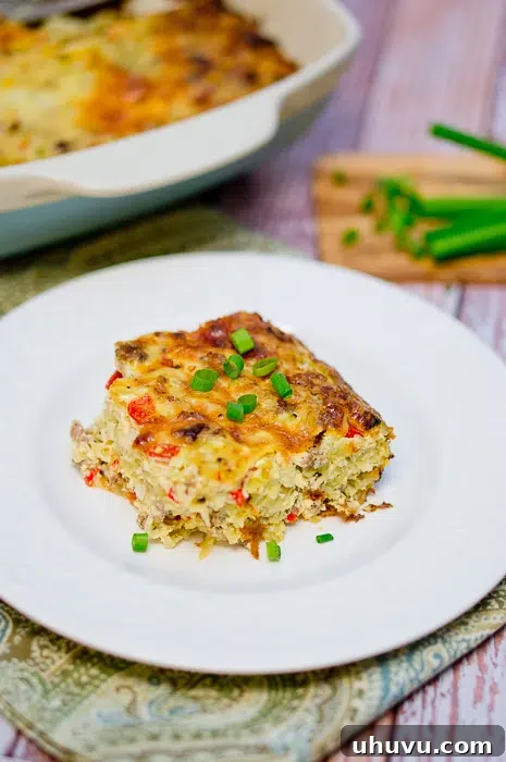 Delicious and hearty breakfast sausage casserole, golden brown and bubbling with cheese