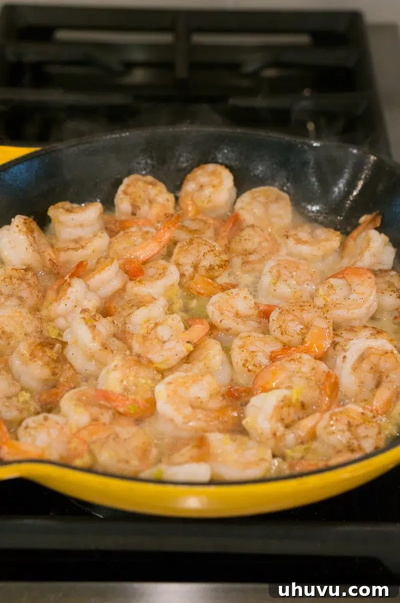 making shrimp scampi on the stove