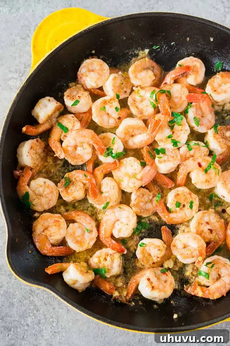 garlic butter shrimp scampi in a cast iron skillet