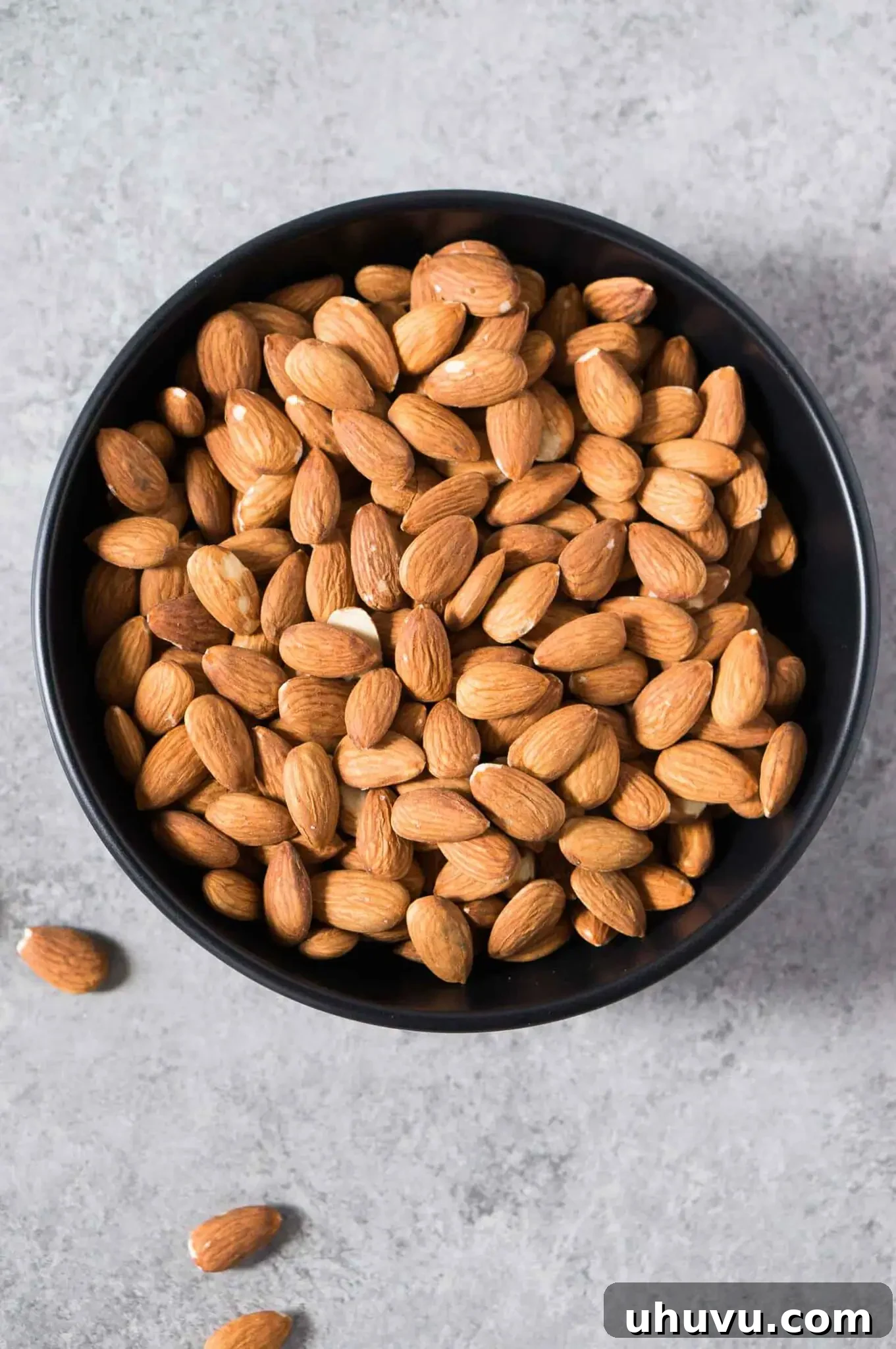 almonds in a black bowl