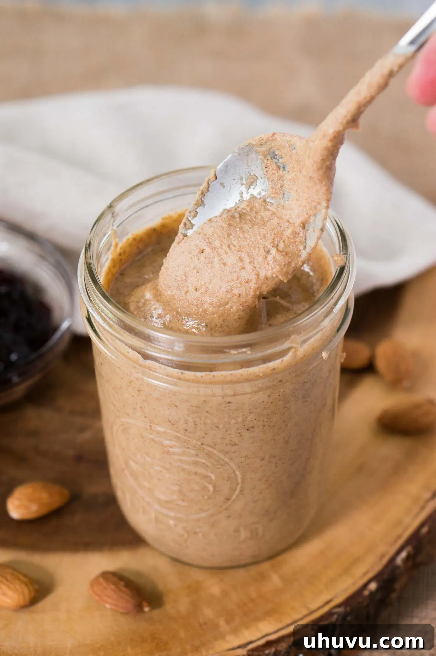 creamy almond butter in a jar