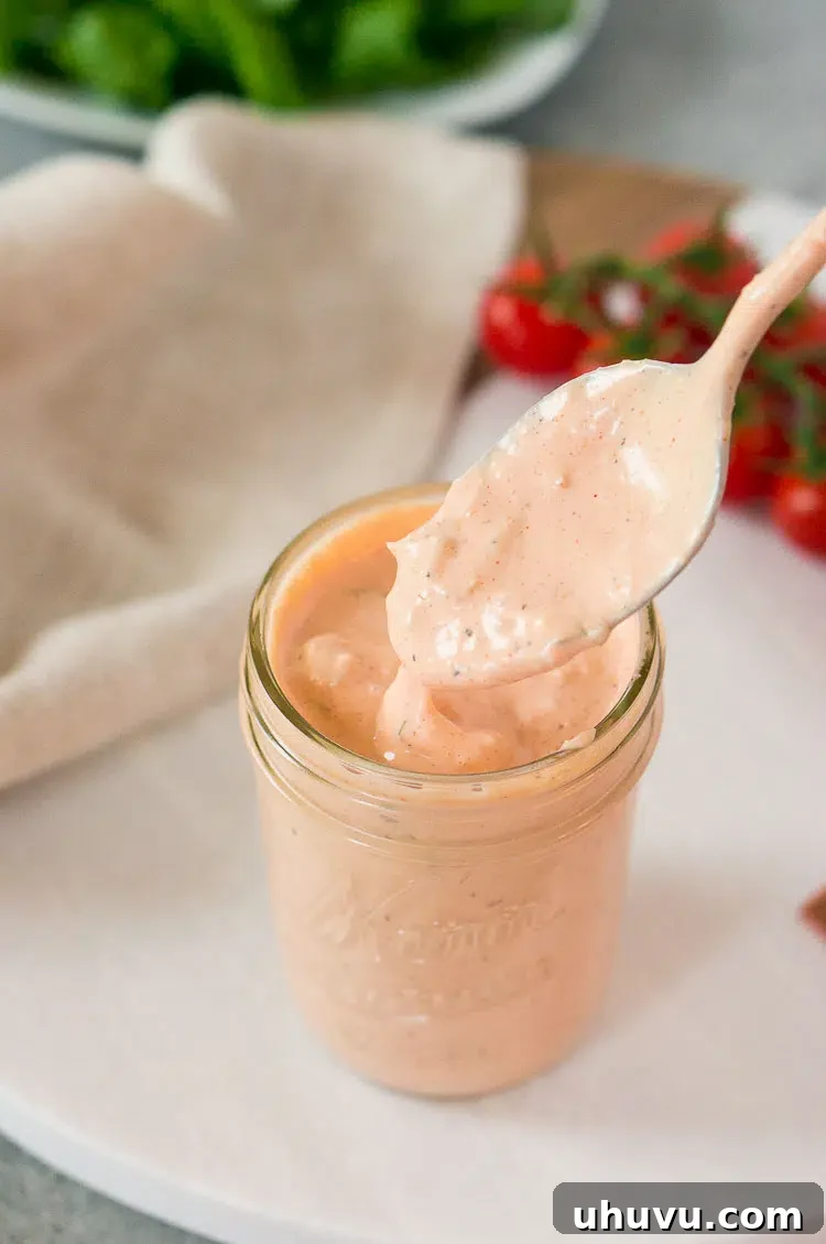 Close-up of freshly made homemade Thousand Island dressing, showcasing its creamy texture.