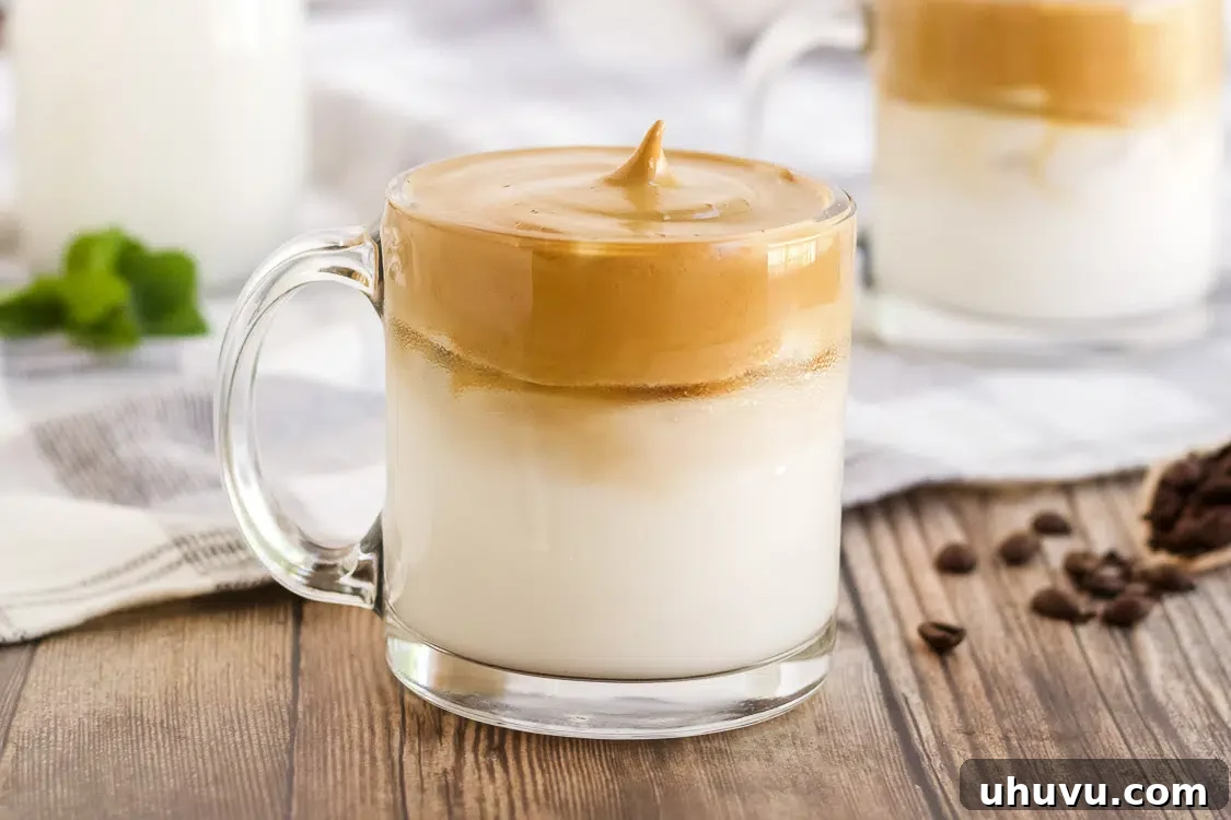 TikTok Dalgona whipped coffee served in a glass mug with ice