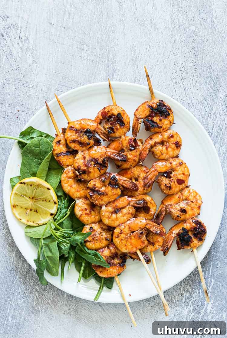 grilled shrimp on white plate