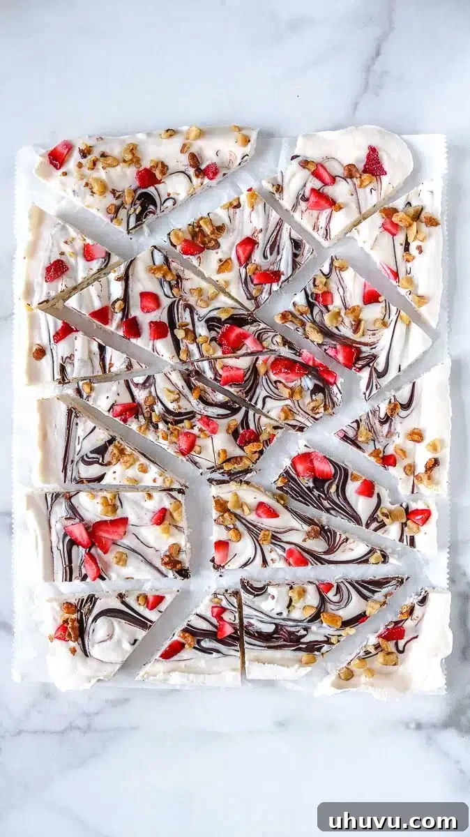 Refreshing Strawberry Frozen Yogurt Bark 6 Beautifully textured keto yogurt bark with generous toppings of strawberries, chocolate, and walnuts.