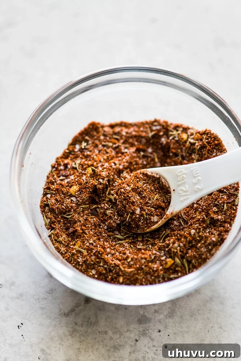 Dry rub for baked pork tenderloin in a small bowl.