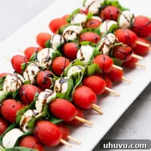 Caprese Salad skewers with mozzarella balls and grape tomatoes