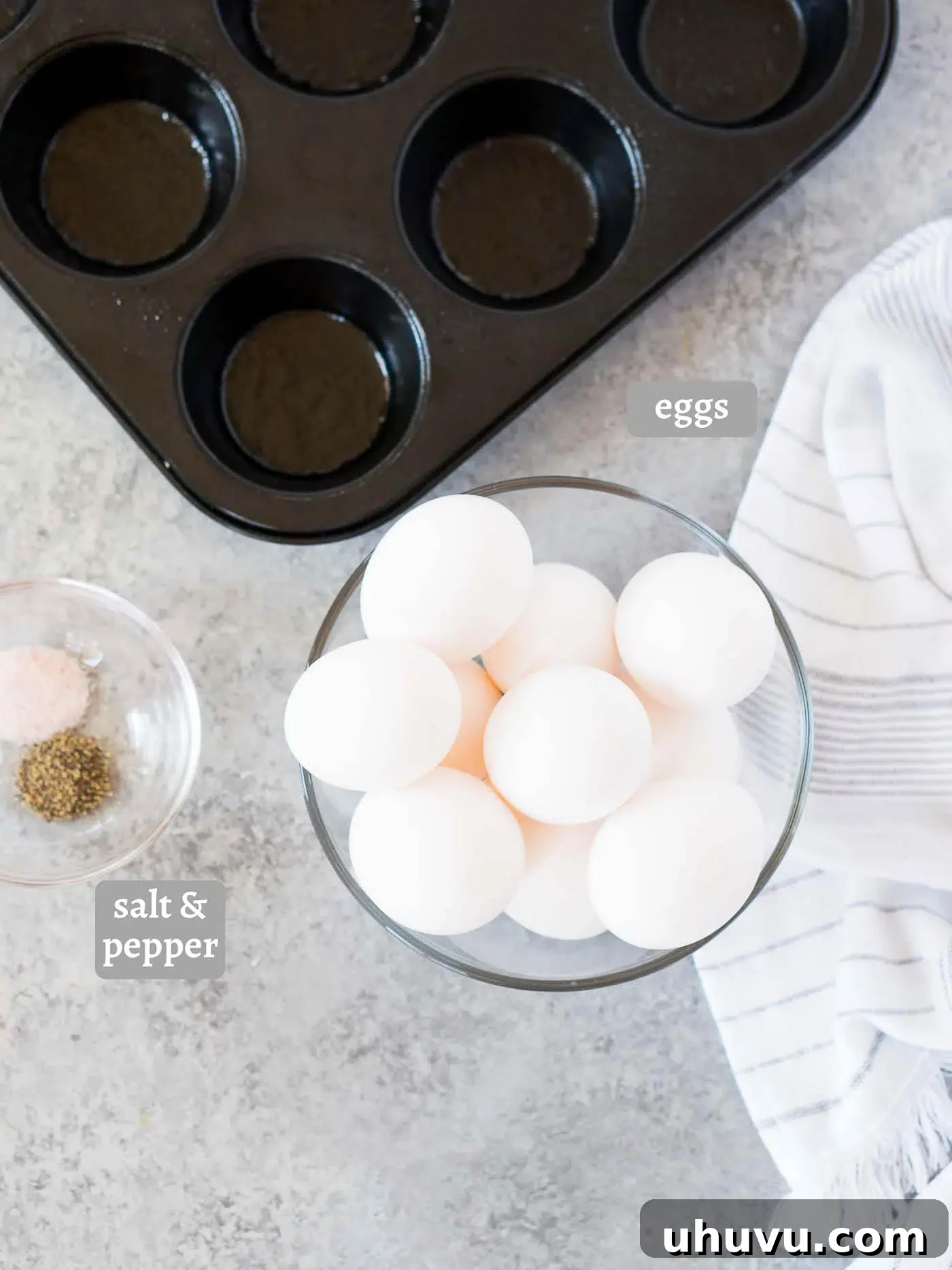 ingredients for eggs in the oven laid out on a table