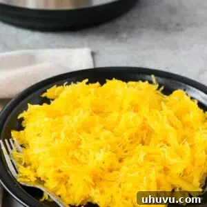 instant pot spaghetti squash on a black plate