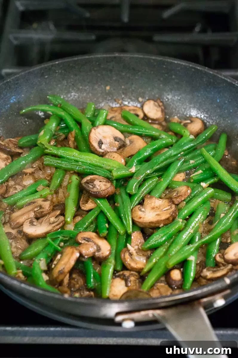 easy Green Beans and Mushrooms in a skillet