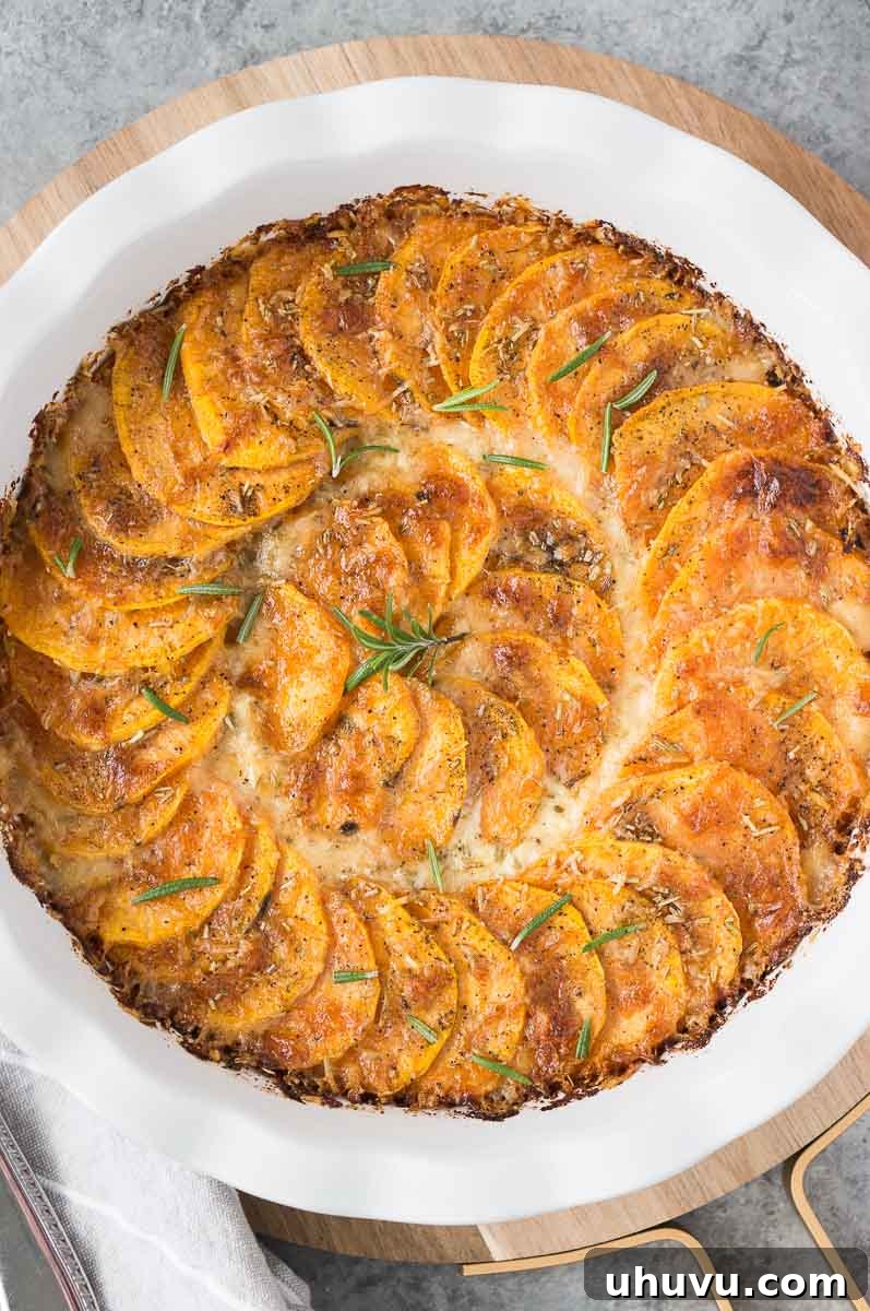 Thanksgiving sweet potato gratin served in a white round dish