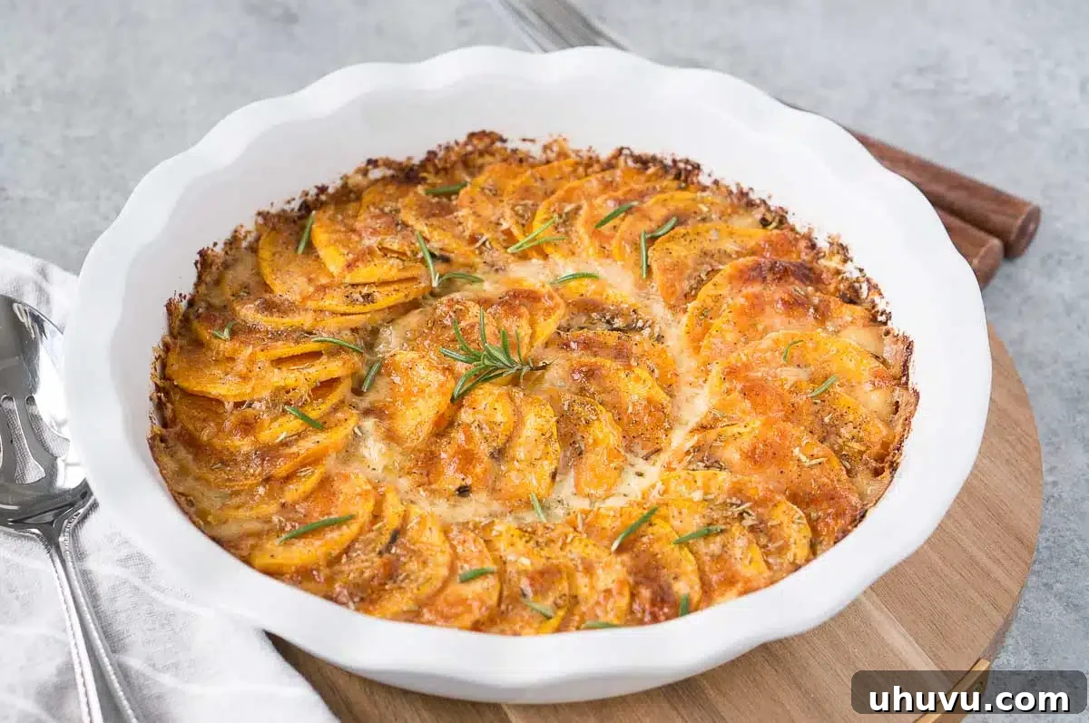Creamy sweet potato bake for Thanksgiving in a white dish, ready to serve