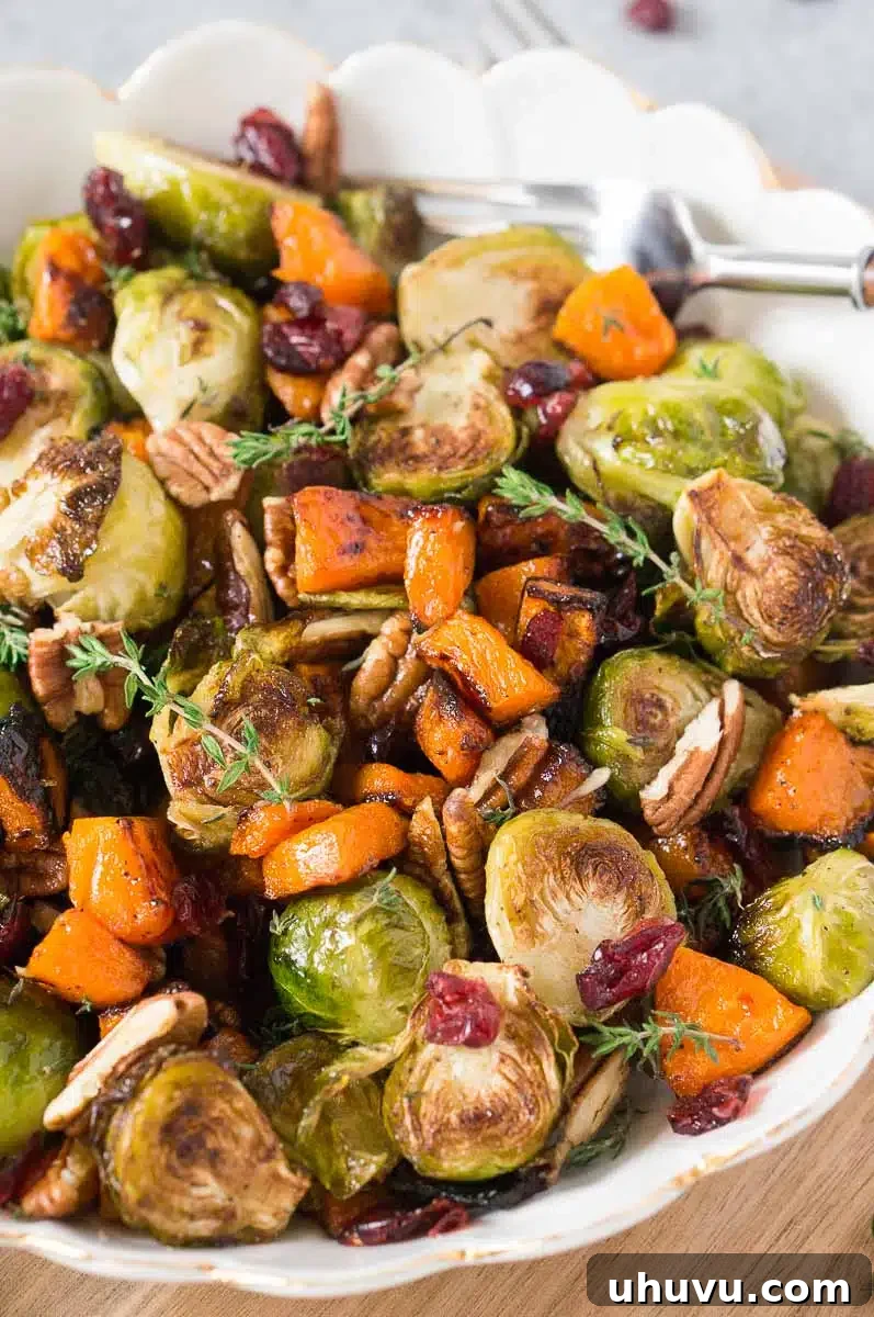 roasted vegetables for Thanksgiving in a white bowl