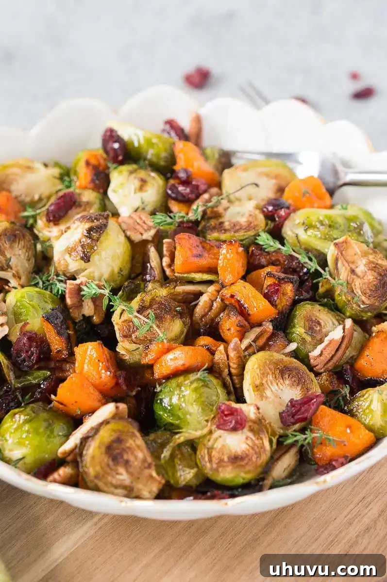 Caramelized Butternut Squash with Crispy Brussels Sprouts 7 roasted fall vegetables for thanksgiving in a bowl