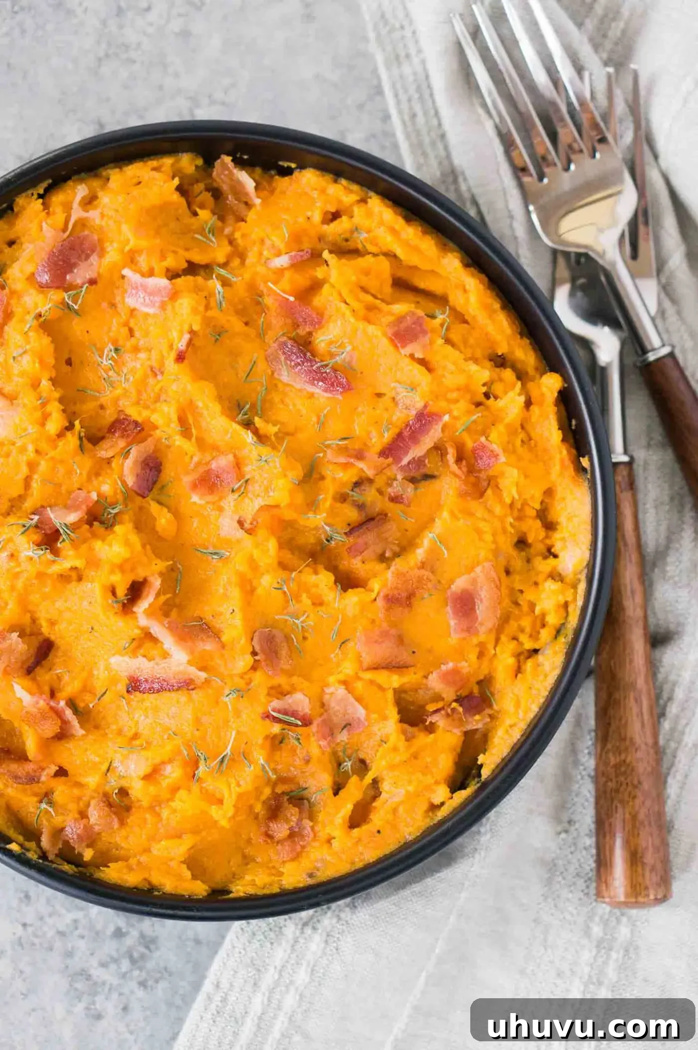 Sweet Potato Bacon Mash 2 mashed sweet potatoes with bacon in a bowl