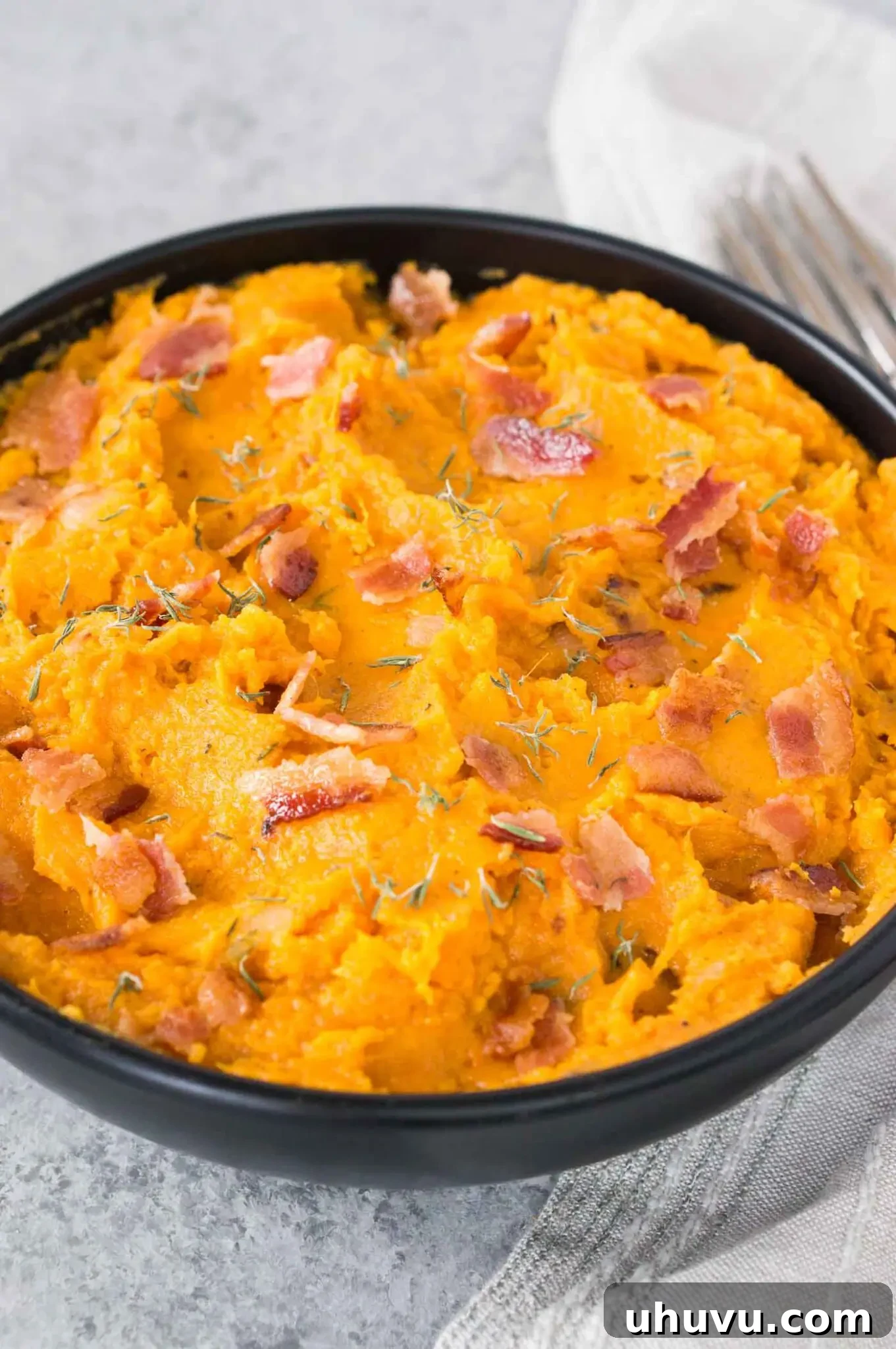 Sweet Potato Bacon Mash 7 bacon with mashed and roasted sweet potatoes in a bowl