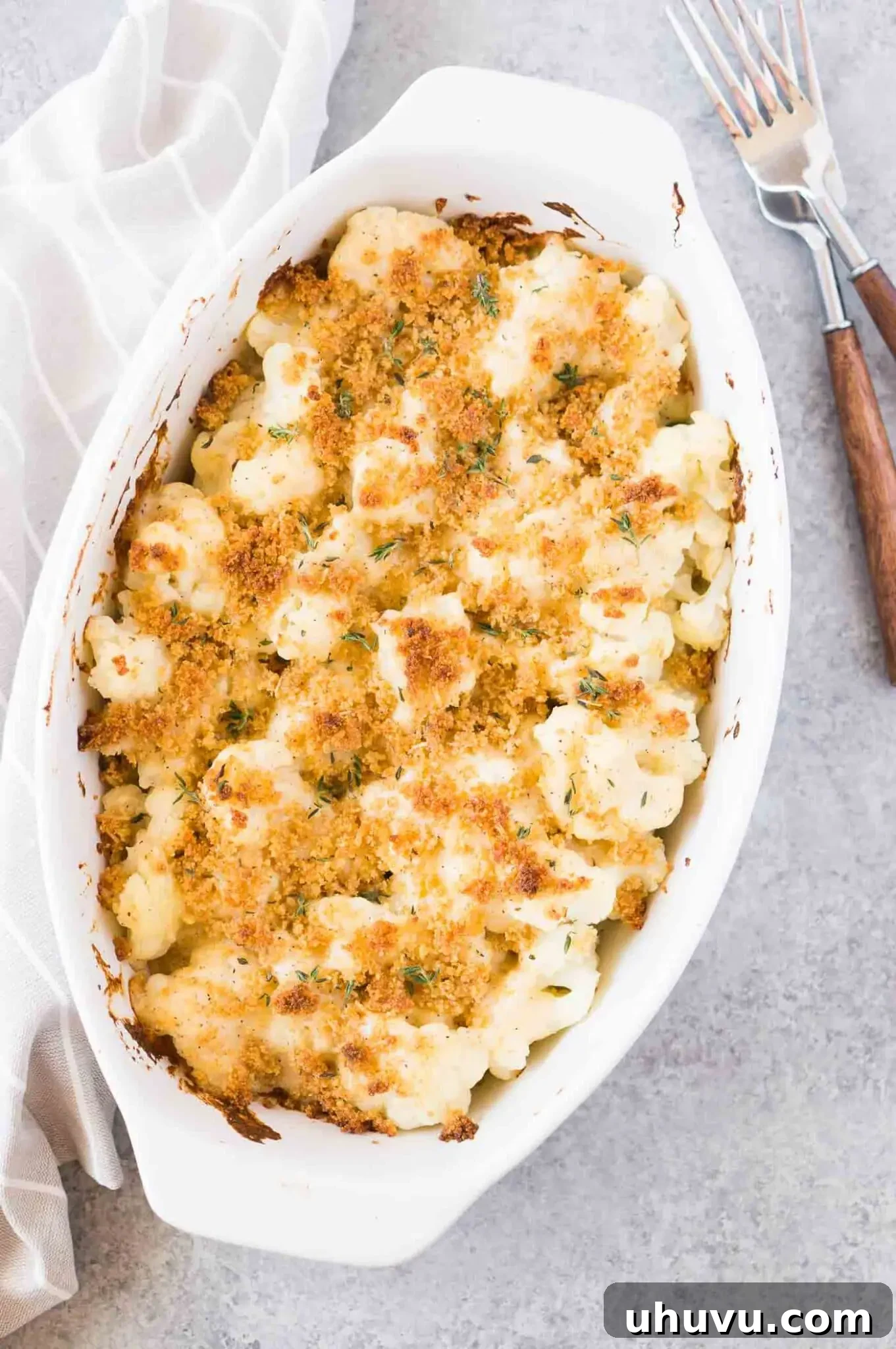 easy cauliflower au gratin for thanksgiving in an oval dish