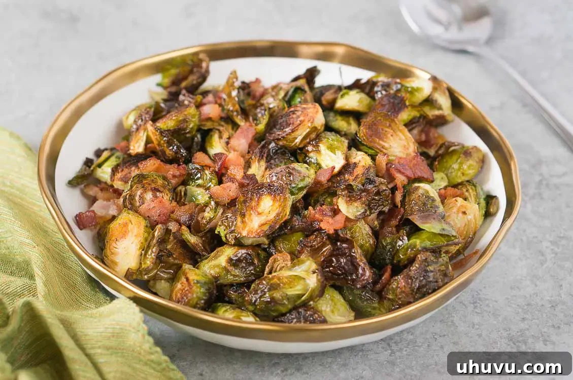 Large platter of perfectly oven roasted Brussels sprouts, golden and crispy