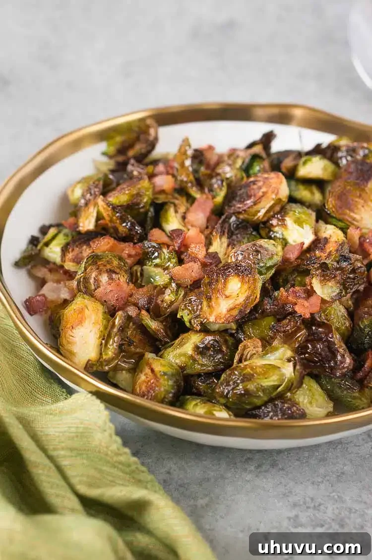 Smoky Bacon Roasted Brussels Sprouts 10 Serving dish filled with perfectly roasted Brussels sprouts and crispy bacon bits