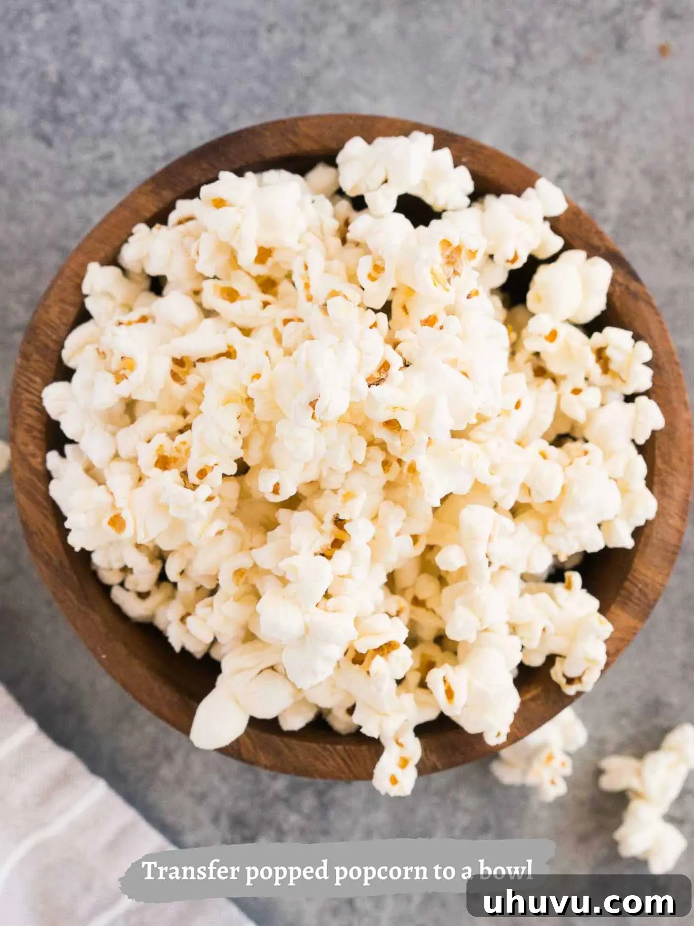 homemade popcorn in a wooden bowl