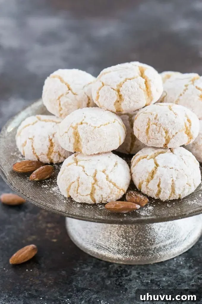 Classic Italian Amaretti 10 Beautifully arranged amaretti cookies on a tiered cake stand, ready for serving.